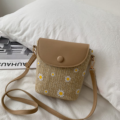 女士时尚拉菲草编单肩包，饰有褶皱细节